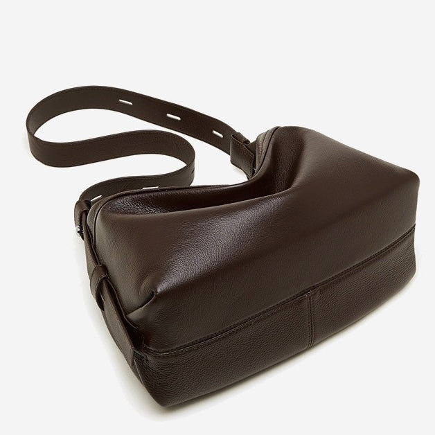 Women's Genuine Pebbled Leather Crescent Bag with Tassel Accent