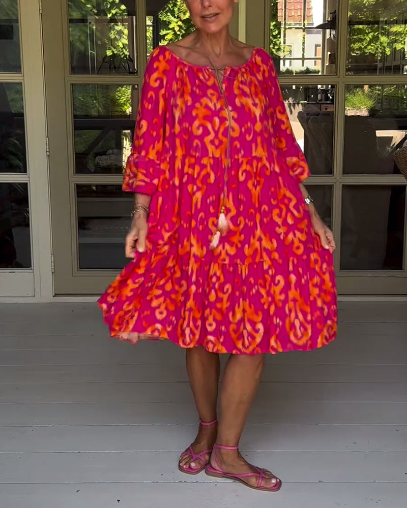Red dress with print and three-quarter sleeves