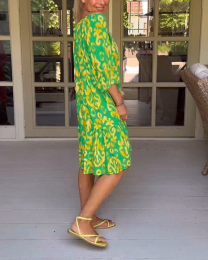 Red dress with print and three-quarter sleeves