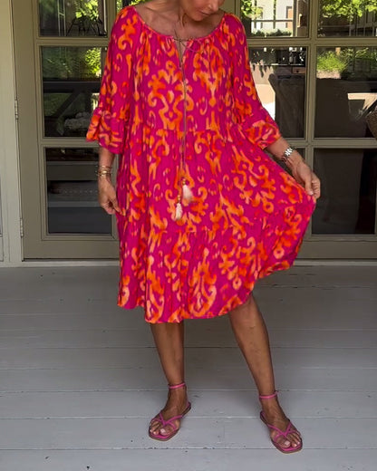 Red dress with print and three-quarter sleeves