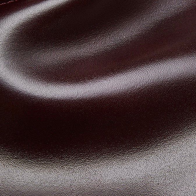 Women's Genuine Leather Dome Satchel with Signature Tassel