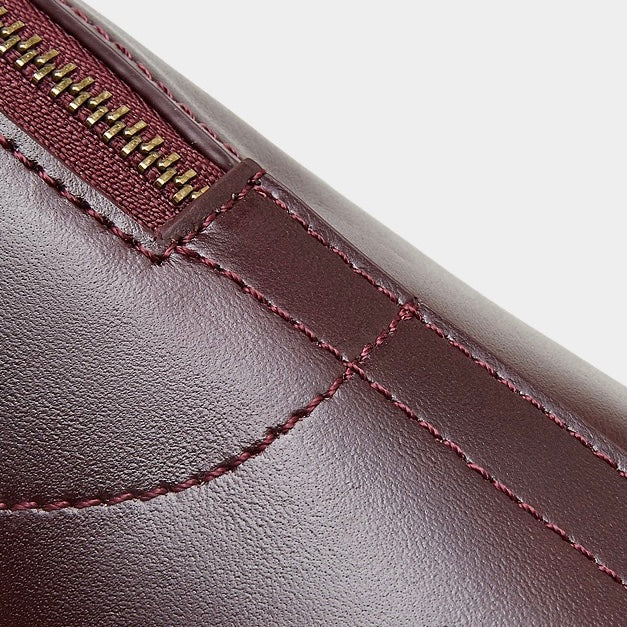 Women's Genuine Leather Dome Satchel with Signature Tassel