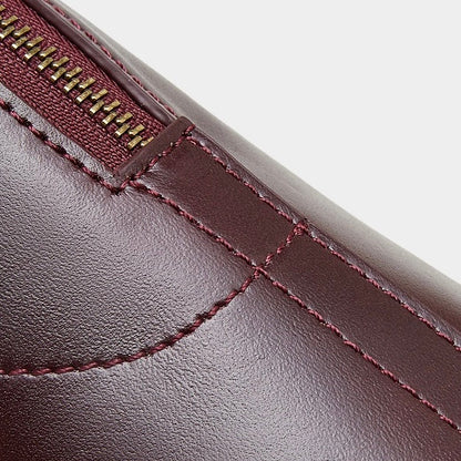 Women's Genuine Leather Dome Satchel with Signature Tassel