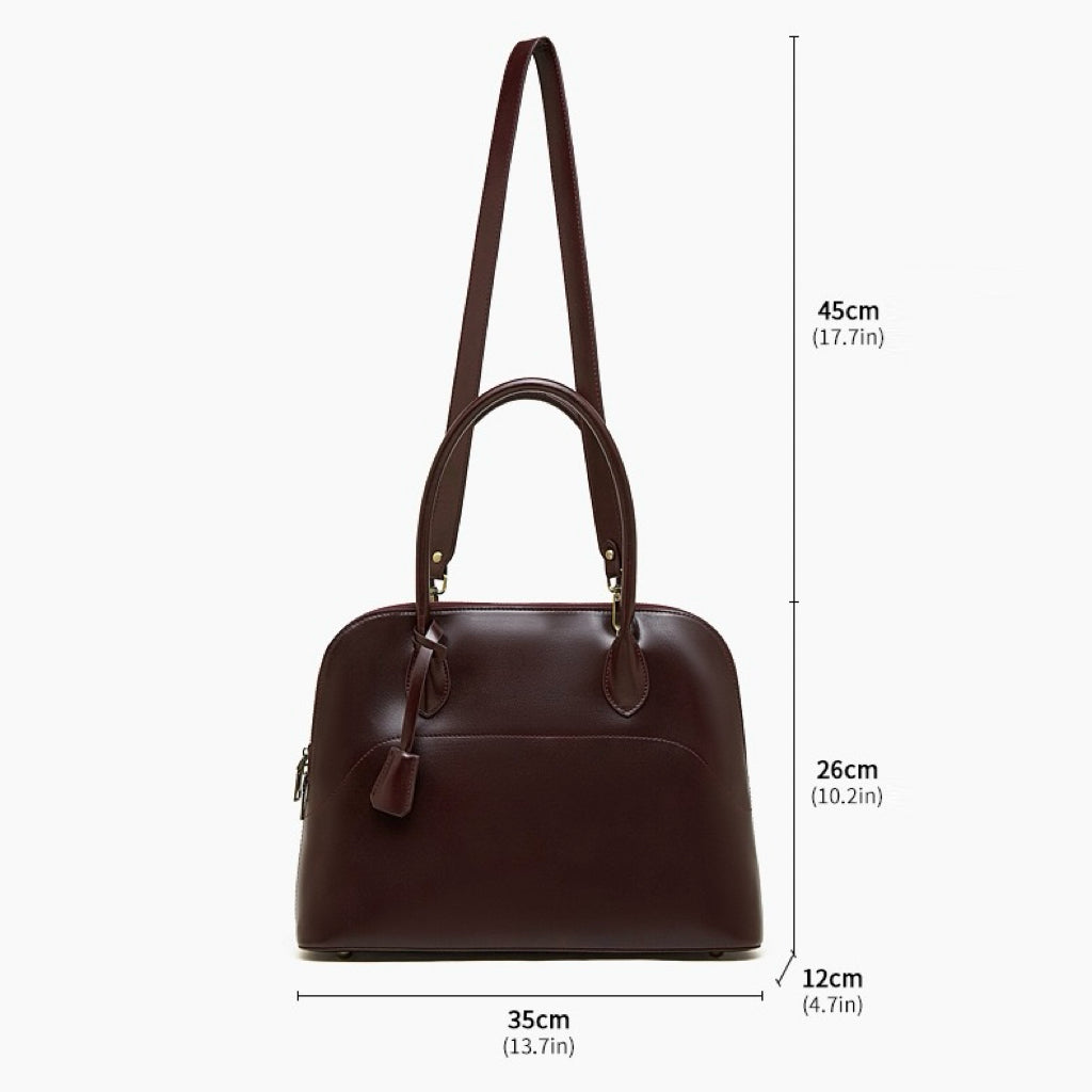 Women's Genuine Leather Dome Satchel with Signature Tassel