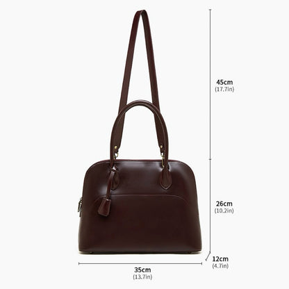 Women's Genuine Leather Dome Satchel with Signature Tassel