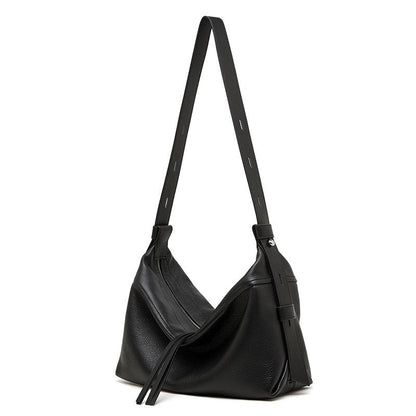 Women's Genuine Pebbled Leather Crescent Bag with Tassel Accent
