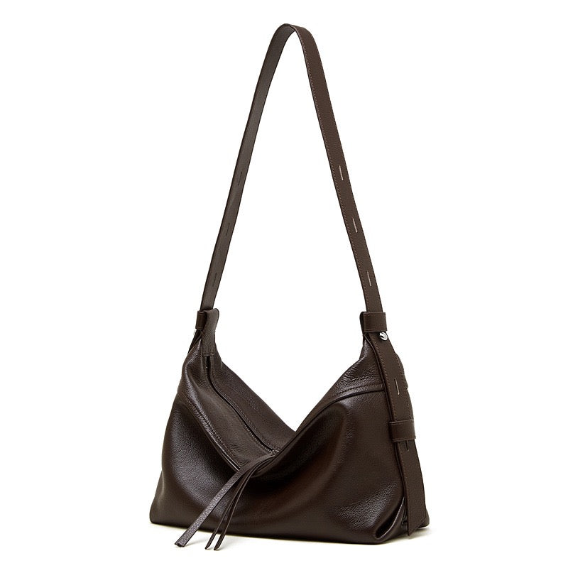 Women's Genuine Pebbled Leather Crescent Bag with Tassel Accent