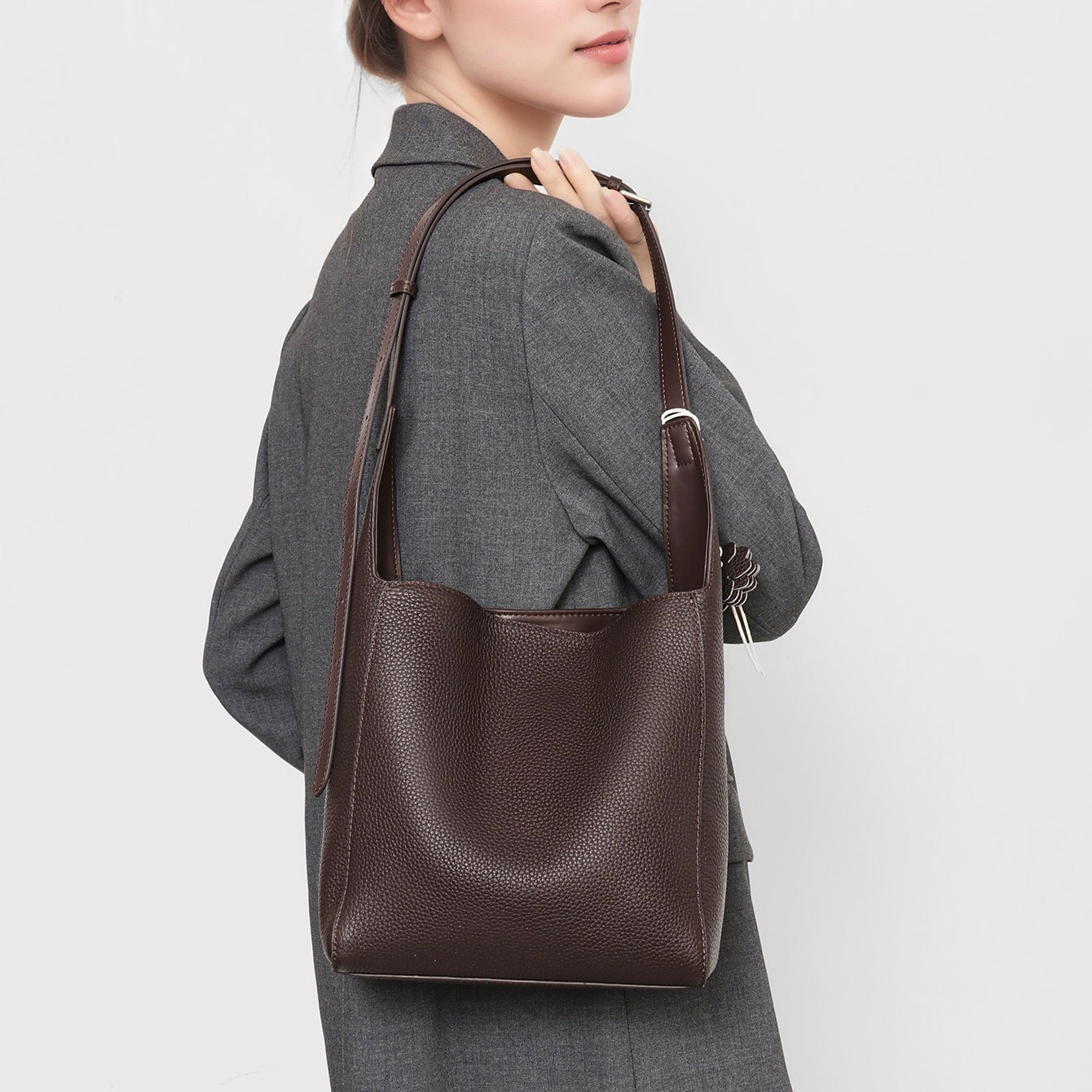 Textured Genuine Leather Hobo Bag with Floral Charm