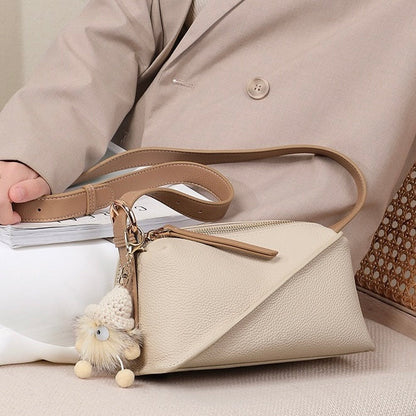 Elegant Geometric Genuine Leather Crossbody Bag with Plush Charm