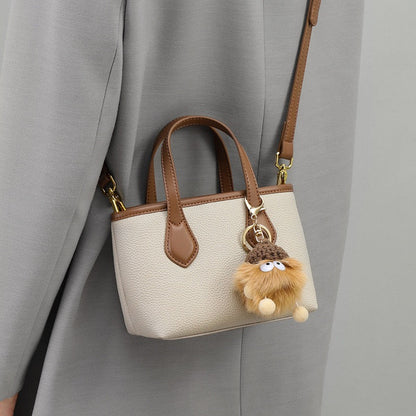 Women’s Genuine Leather Cute Mini Pom Pom Bucket Crossbody Handbag